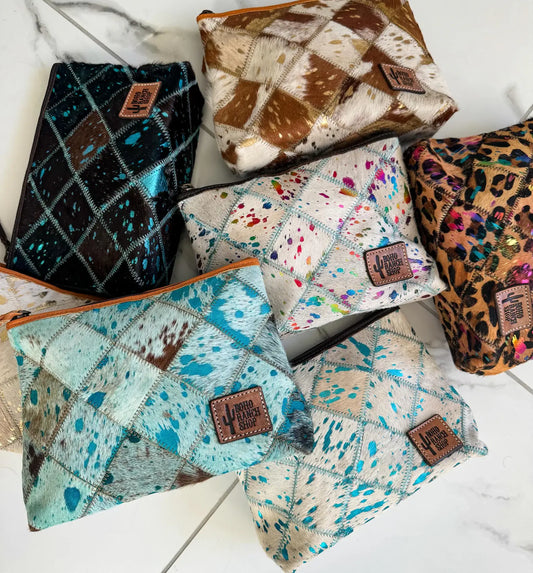 Western Cowhide Makeup Bag Travel: BLACK + WHITE